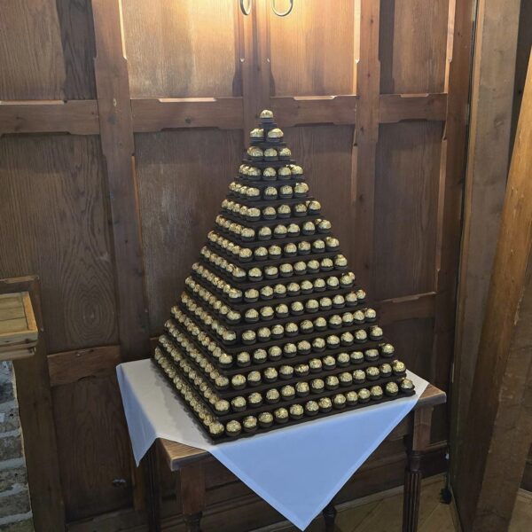 Image shows Ferrero Rocher stand set up at wedding, hire from SOS Entertainment