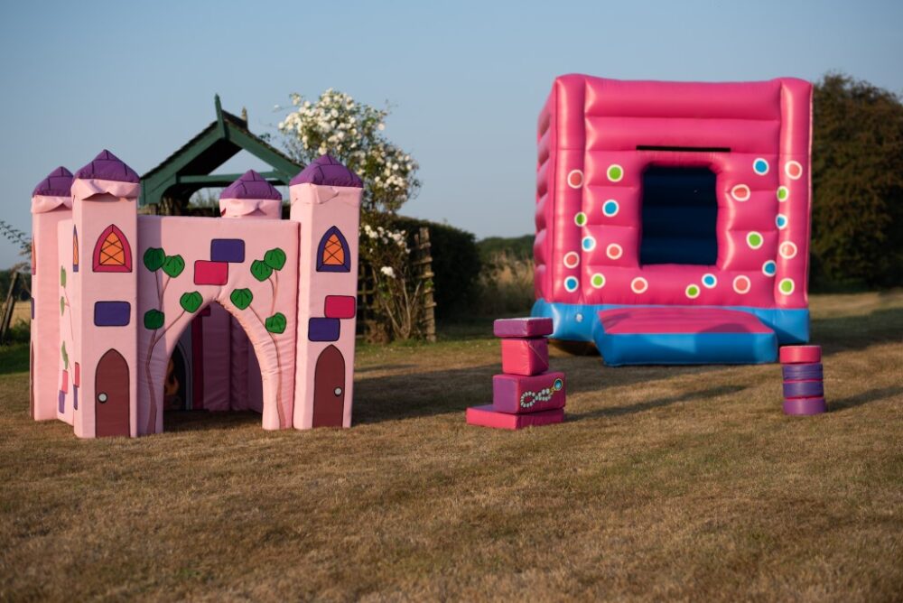 pink bouncy castle, pink Fairy Tale play castle to hire