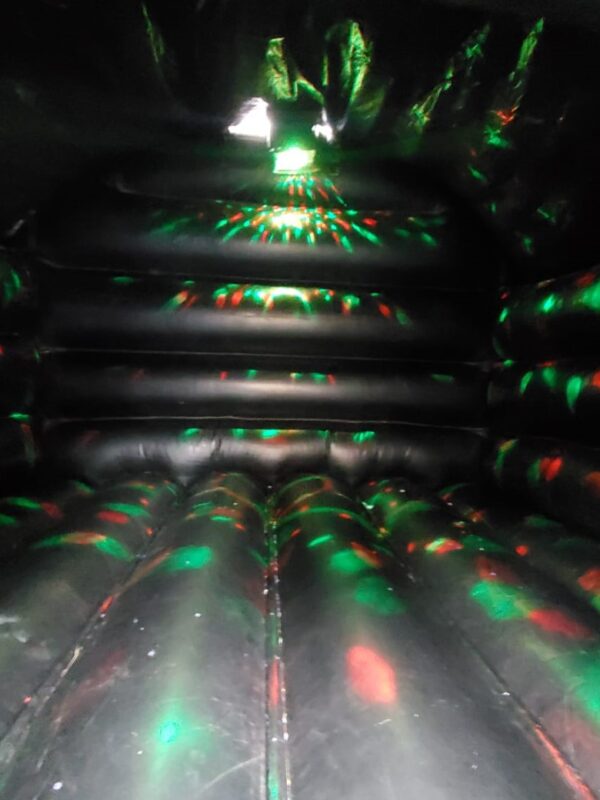 lights inside disco bouncy castle for hire