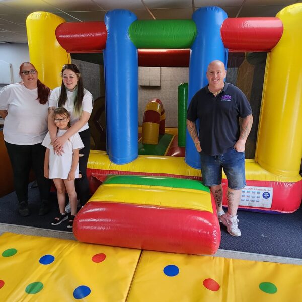 SOS Entertainment bouncy castle hire donation for charity fundraiser