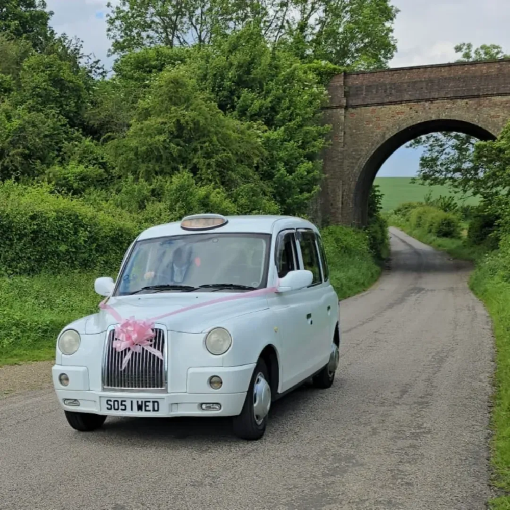 white london taxi cab for weddings hire from SOS Entertainment, Kent, Sussex, Surrey, Essex